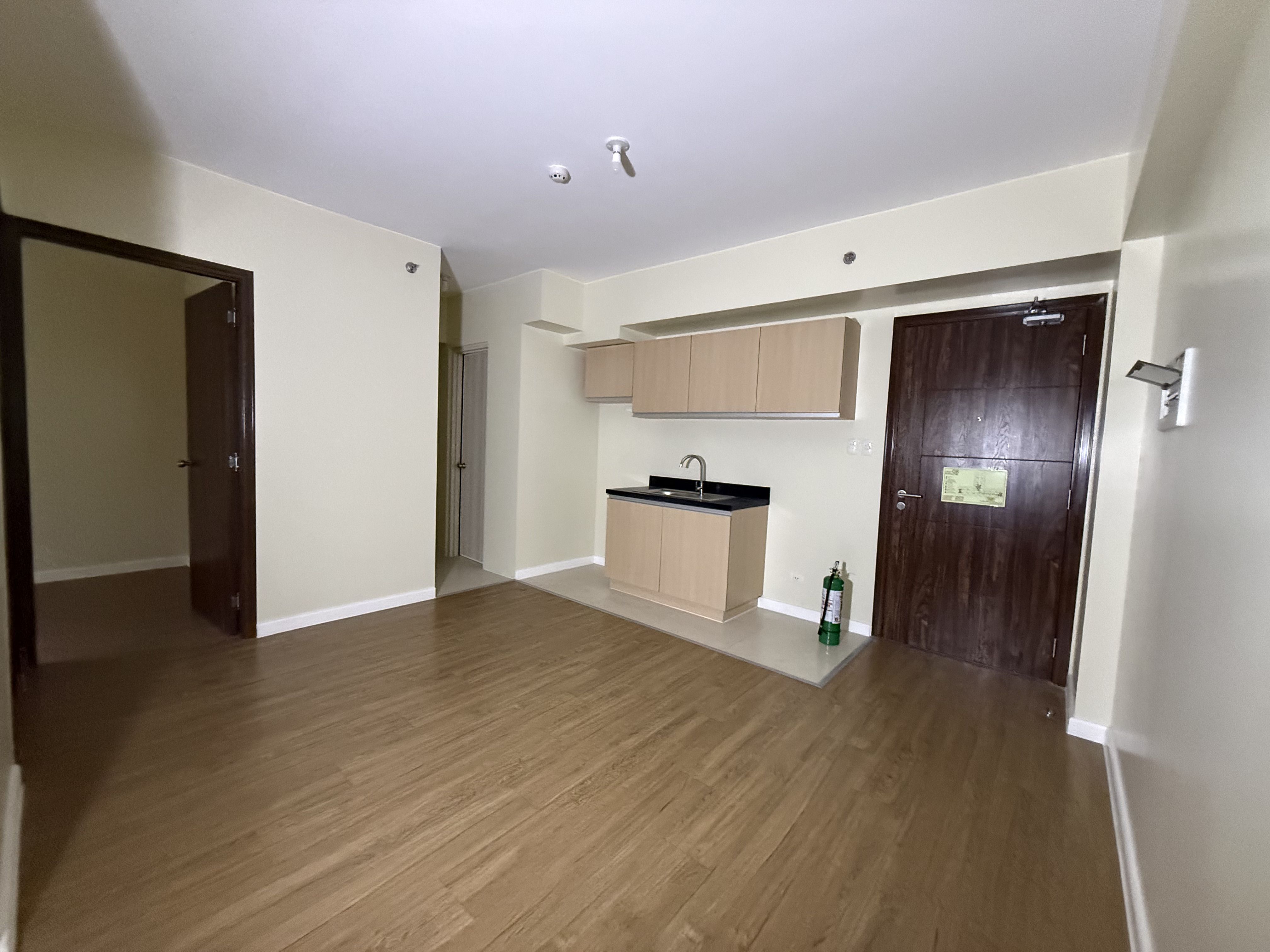 Unit 1-208 2/F Tower 1 One Antonio Sacred Heart corner Dao Sys. Brgy. San Antonio Makati City (With Parking Slot)